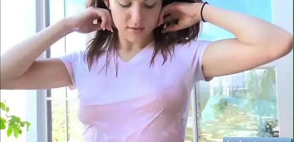  Sexy teen Fiona wearing a wet t-shirt and playing with her perky nipples